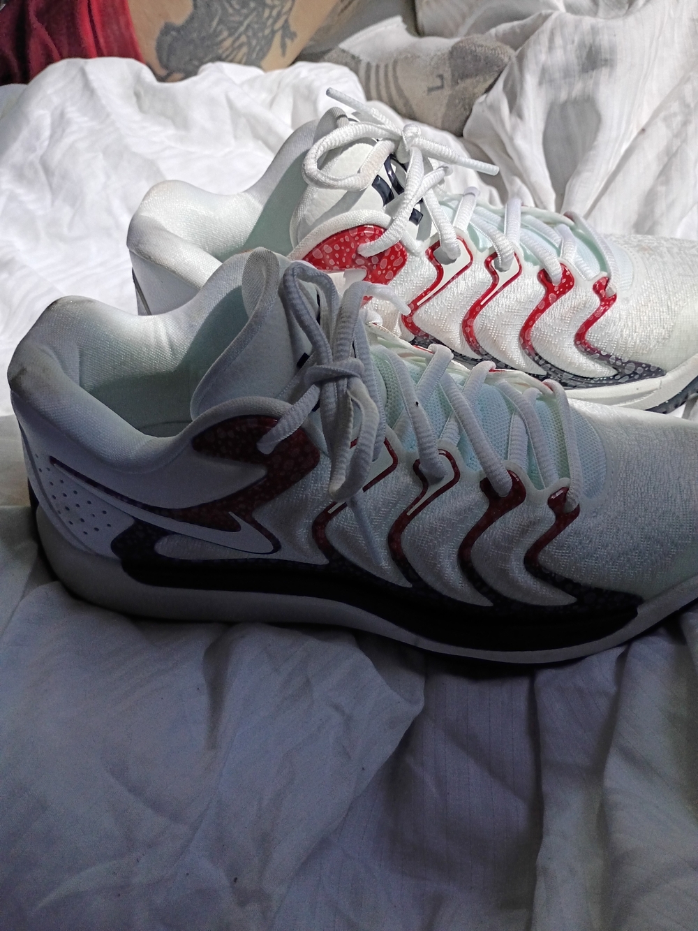 Nike Women's White Sneakers with Red and Black Accents